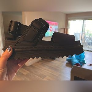 Never-been-worn black Doc Marten platform sandals.